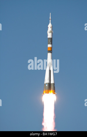 The Soyuz TMA-12 spacecraft lifts off into a cloudless sky. Stock Photo