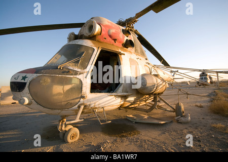 Baqubah, Iraq - An Iraqi Mi-2 helicopter sits on the flight deck abandoned at Camp Warhorse. Stock Photo