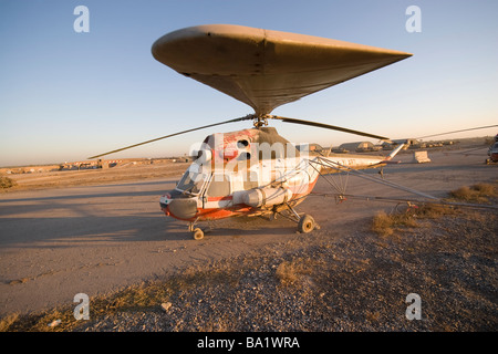 Baqubah, Iraq - An Iraqi Mi-2 helicopter sits on the flight deck abandoned at Camp Warhorse. Stock Photo