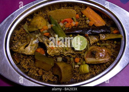Thieboudienne Ceebu Jen Poisson au Riz a delicious one-pot meal with rice,  fish stew and a variety of vegetables that is popular in Senegal closeup on  Stock Photo - Alamy