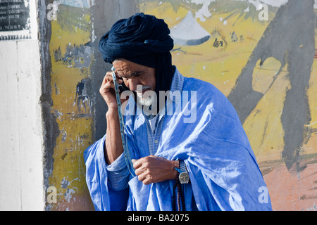 Old Mauritanian Man Using a Cellphone in Nouadhibou Mauritania Stock Photo