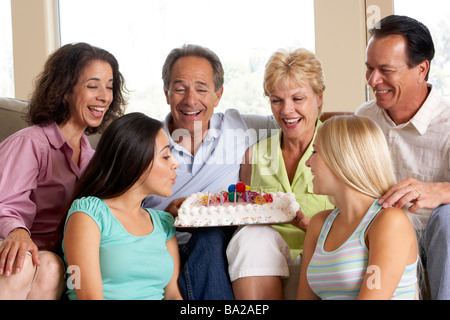 Two Families Celebrating A Birthday Together Stock Photo