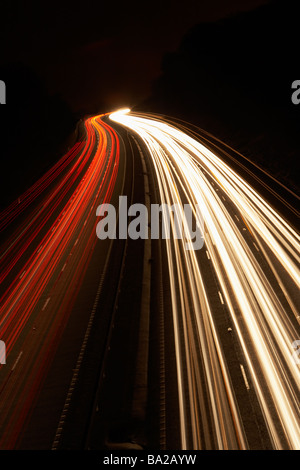 Headlights And Tail Lights On A Motorway At Night Stock Photo