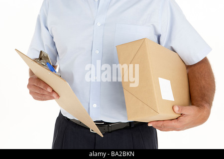 Courier Holding A Parcel And Clipboard Stock Photo