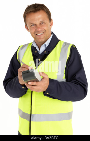 Courier Writing On An Electronic Clipboard, Smiling At The Camera Stock Photo