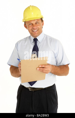 Portrait Of A Foreman Writing On A Clipboard Stock Photo