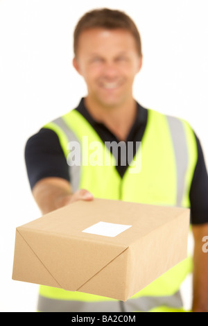 Courier Holding A Parcel And Clipboard Stock Photo