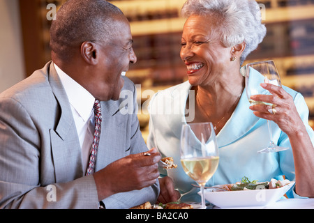 Senior Couple Having Dinner Together At A Restaurant Stock Photo