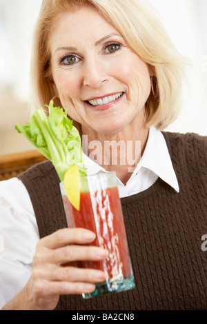 Woman Drinking A Bloody Mary Stock Photo