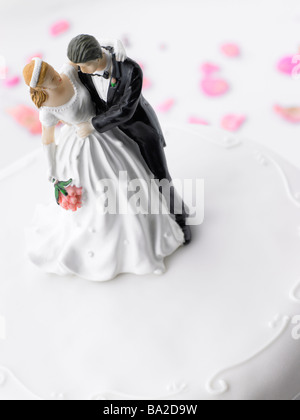 Wedding Cake With Bride And Groom Figurines Stock Photo