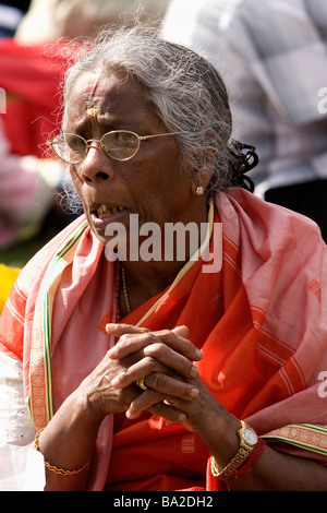 Sri Lankan old woman protests in Parliament Square demonstrating against their government s actions in Sri Lanka Stock Photo