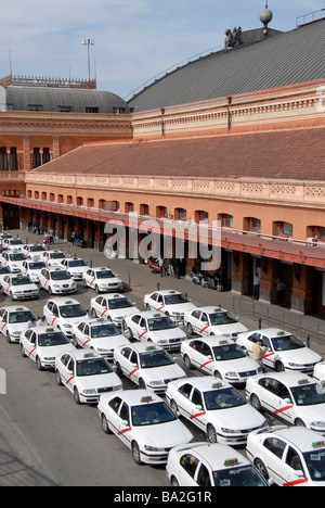 Taxis waiting before Atocha railway station, Madrid, Spain Stock Photo