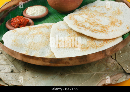 Set dosa is a set of 3dosas topped with butter or ghee and served with ...
