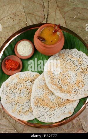 Set dosa is a set of 3dosas topped with butter or ghee and served with ...