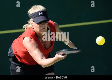 Senior citizens compete in game of Pickleball in the Senior state Olympics near Naples Florida Stock Photo