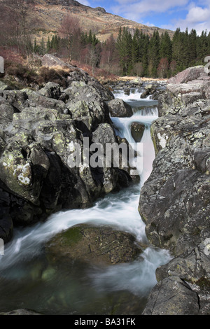 The River Duddon cascading through Birks Rapids above Birks Bridge in The Duddon Valley Dunnerdale Lake District Cumbria UK Stock Photo