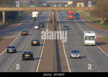 cars and vehicles on the M1 motorway in county armagh Northern Ireland Stock Photo