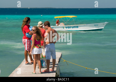 tourists waiting on boats Los Roques Venezuela South America Stock Photo