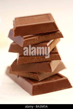 Stack of chocolate squares close up Stock Photo - Alamy