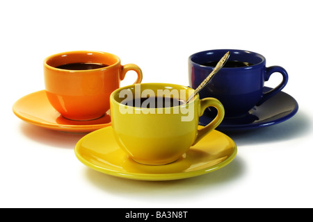 Three color coffee cups isolated on white with maximum DOF clipping path Stock Photo