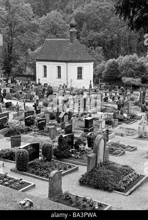 Eighties, black and white photo, people, death, mourning, churchyard, graves, grave stones, chapel, Black Forest, Baden-Wuerttemberg Stock Photo