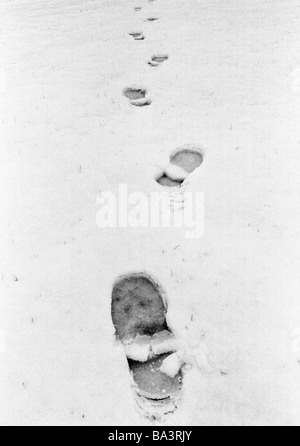 Seventies, black and white photo, winter, weather, snow, footprints in the snow Stock Photo