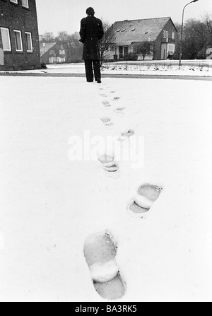 Seventies, black and white photo, winter, weather, snow, footprints in the snow Stock Photo