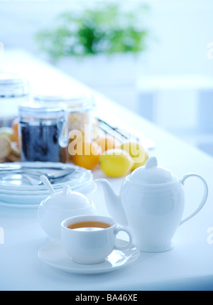 Close up of tea set on kitchen table Stock Photo