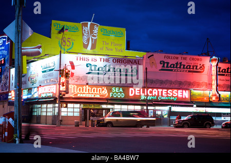 Nighttime view of Nathans Delicatessen Restaurant in Coney Island, New York (For Editorial Use Only) Stock Photo