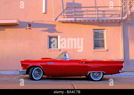 Gleaming red1957 Ford thunderbird convertible, parked on the street in the lakewood area of Dallas. Stock Photo