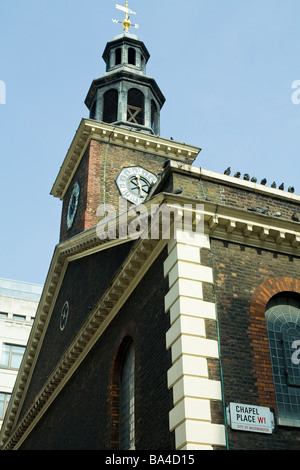Chapel Place church in London with pigeons on roof Stock Photo