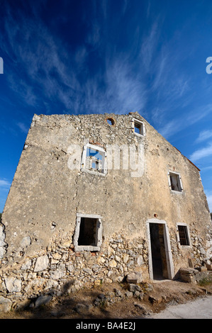 Ruin of traditional stone wall house, with no roof, windows and door on island Cres, Croatia, Europe Stock Photo