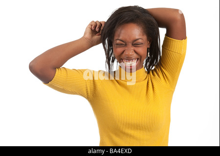 Young Woman Of African American Ethnicity Having Fun and Smiling Studio Shot Portrait Stock Photo