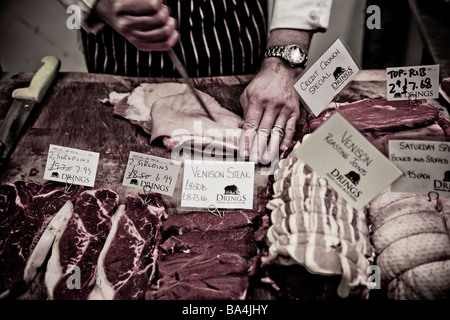 Drings butchers in Greenwich London has cheaper cuts of meat on offer to customers during the current recession. Stock Photo