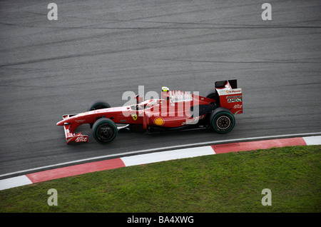 Ferrari driver Kimi Raikkonen, of Finland, pulls put of the pits during ...