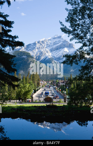 Road  and Snow-Coved Mountains at Banff in Canada Stock Photo
