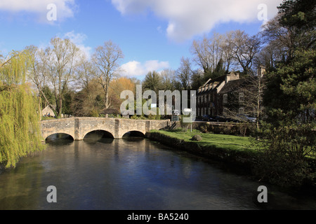 Bridge over the River Coln in the village of Bibury, The Cotswolds, Gloucestershire, England, UK Stock Photo