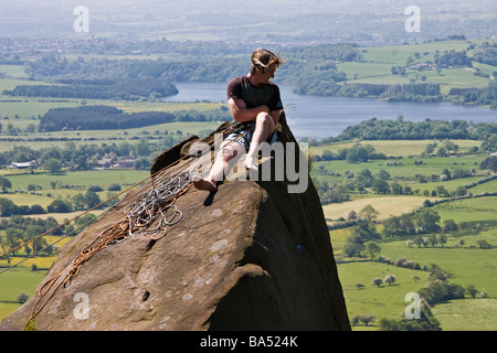 Climber on the Roaches (view towards Tittesworth Reservoir), Peak District National Park, Staffordshire. Stock Photo