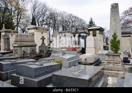 PARIS, France - Cimetière du Montparnasse. Includes the graves of a great number of France's artists and writers, including Simone de Beauvoir, Samuel Becket, and Charles Baudelaire Stock Photo