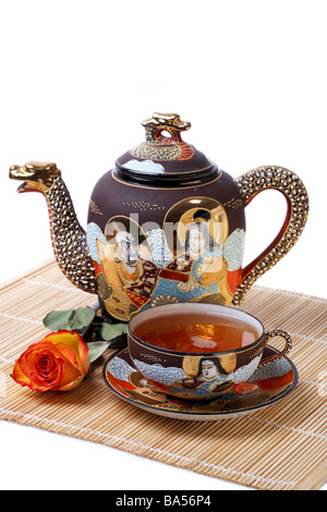Tea set, Tea Cup with Teapot and Rose Stock Photo