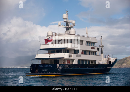 Superyacht 'Big Aron' underway off St Kitts from stern quarter Stock Photo