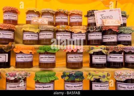 Country home made jams on display at Petersfield twice weekly market, Hampshire UK Stock Photo