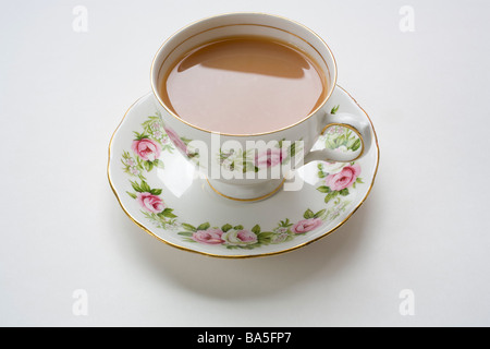 Cup of tea in a bone china cup with saucer Stock Photo