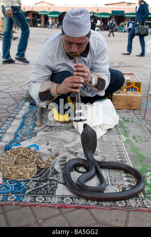 Snake charmer in Djemaa El Fna in Marrakech Stock Photo