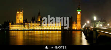 British Houses of Parliament with Big Ben at night taken from Queens Way. High resolution panorama. Stock Photo