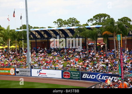 Fans sitting on the berm at a spring training baseball game at Tradition Field, Port St. Lucie, FL, USA Stock Photo