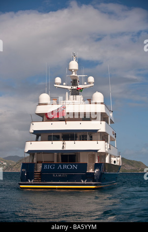 Superyacht 'Big Aron' underway off St Kitts from the stern Stock Photo