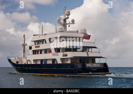 Superyacht 'Big Aron' underway off St Kitts viewed from the stern quarter Stock Photo