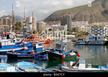 Los Cristianos Tenerife canary Islands harbour spanish fishing fleet boats on the quay Stock Photo