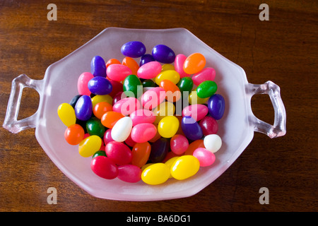 A pink bowl of jelly beans Stock Photo